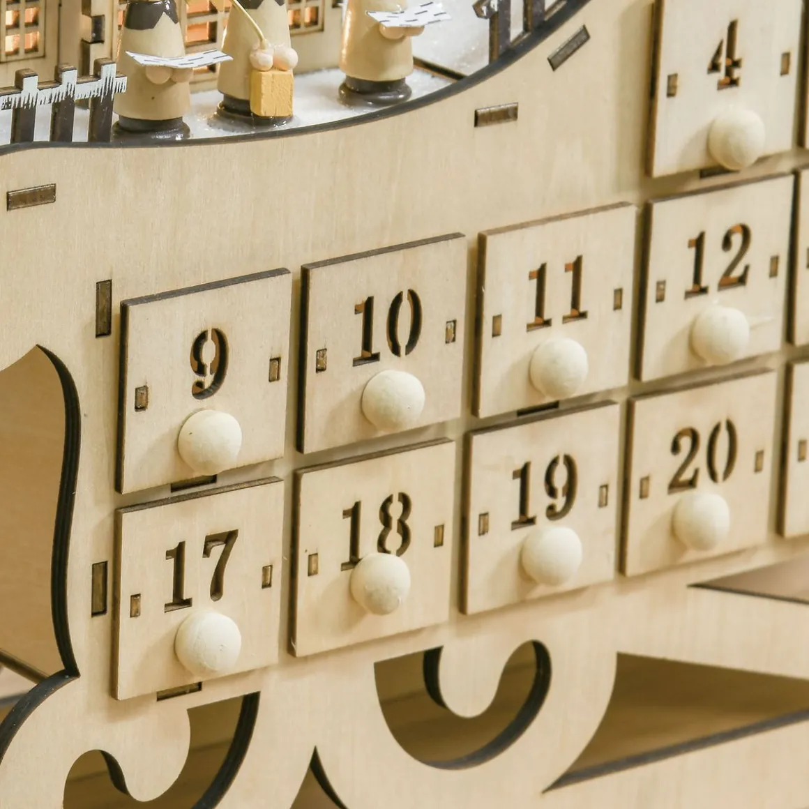 Calendario de Adviento Trineo Homcom pueblo + 24 cajones + luces LED natural 31x45x10 cm