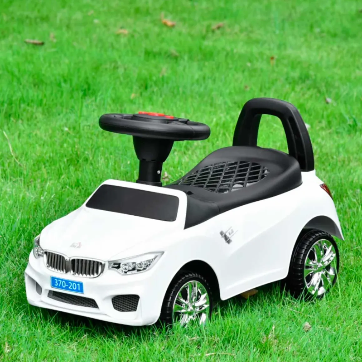 Coche correpasillos Homcom con música y bocina +18M blanco 36x28x63,5 cm