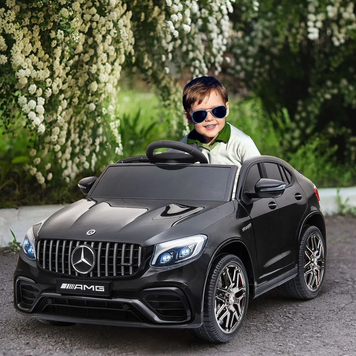 Coche eléctrico infantil Mercedes AMG Homcom con música + luces negro 55x115x70 cm
