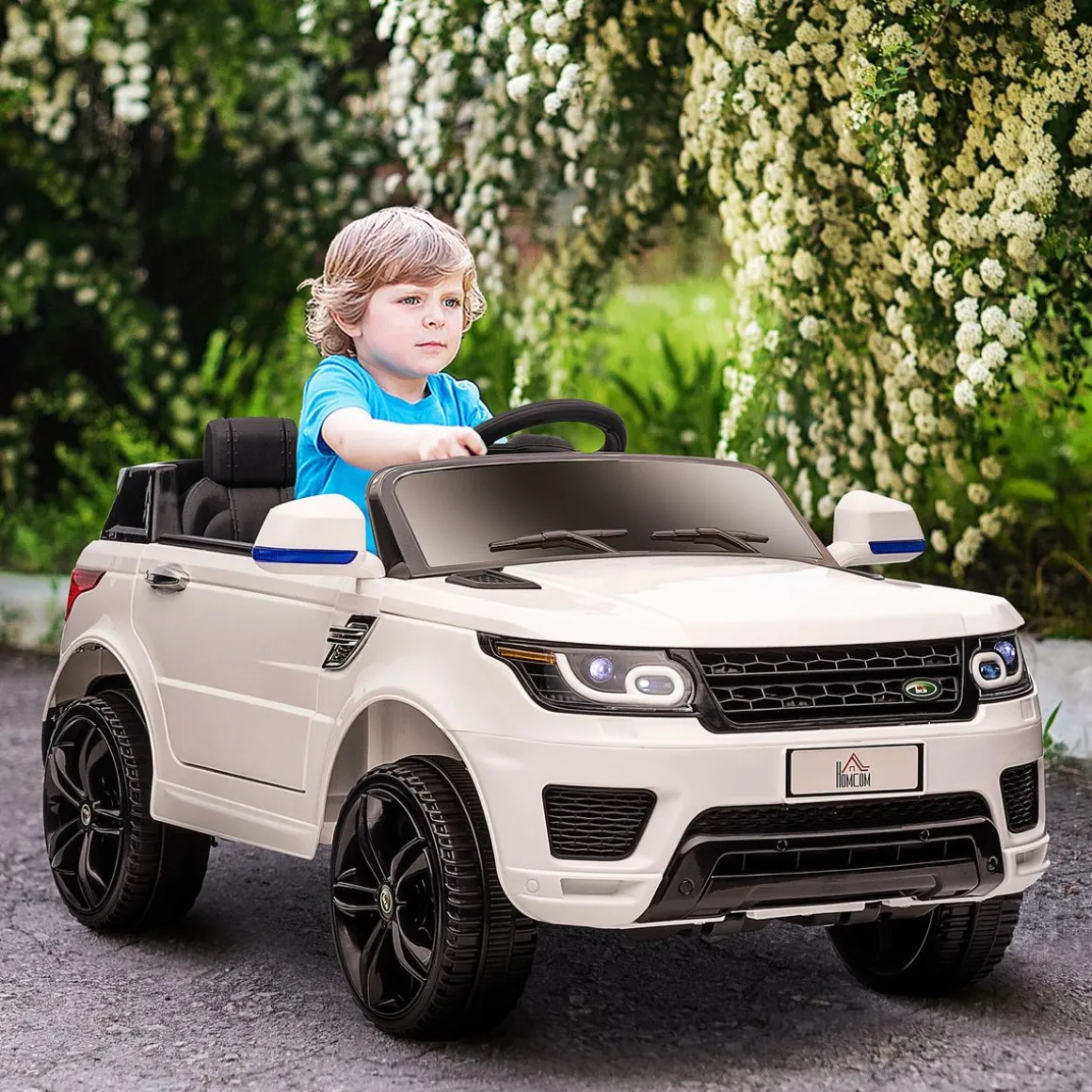 Coche eléctrico infantil Premium Homcom control remoto + bluetooth + luces led blanco 52x68x110 cm