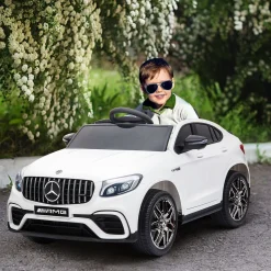 Cochecito eléctrico Mercedes AMG Homcom con mando +3A blanco 55x115x70 cm