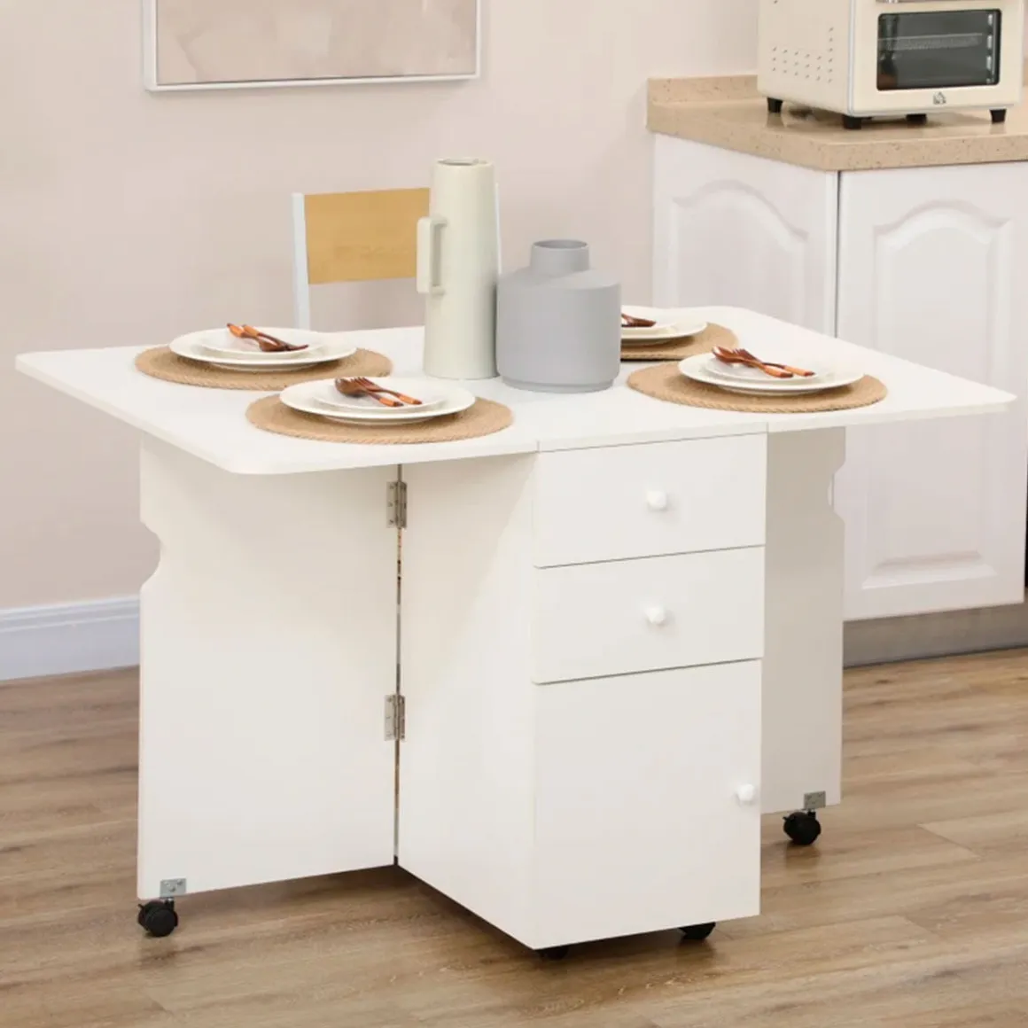 Mesa de comedor Oke Homcom plegable 2 cajones + 1 armario + ruedas blanco 75x35-120x80 cm