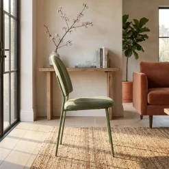 Silla de comedor Kamili redondeada patas acero 84x43x57 cm